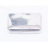 A William IV silver snuff box plain rectangular, the base with bright-cut engraved decoration,