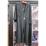 A black 1930's crepe/taffeta mixed ladies coat, the coat has a swing panel design at the back,