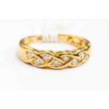 An 18ct gold and diamond half eternity ring, size I½, approx 3.