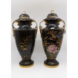 A pair of Alton Ware two handled pottery vases and covers