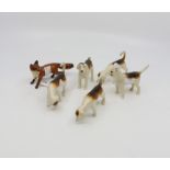 A Beswick fox with five hounds