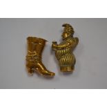 Two Victorian brass novelty vesta cases,