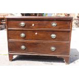 A George III mahogany chest of drawers, circa 1820, fitted with three long graduated drawers,