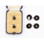 A pair of 18ct white gold, black enamel and diamond studs, in a fitted Selfridge London box,