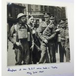 A collection of militaria to include: WW2 Press Release photos,