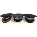 A collection of British & World Police caps to include: Belgian, British Mersey Tunnels Police,
