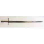 Broadsword with fullered double edged blade 88cm long. Straight crossguard.