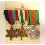 WW2 British Medal group consisting of 1939-45 Star, Italy Star, and Defence Medal.