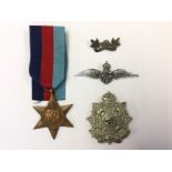 WW2 British 1939-45 Star complete with ribbon, a OR's Border Regiment cap badge,