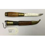 Finnish Puukko knife with single edged 95mm long blade inscribed with owners name in Finnish.