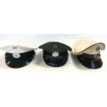 A collection of six West German Police Officers Schirmmutze peaked caps to include Hesse x 2 and