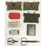 WW2 US Army First Aid kit collection: three first aid pouches each complete with dressings: