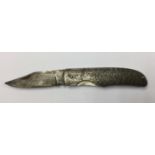 Damascus Steel pocket knife. 65mm single edged damascus blade.