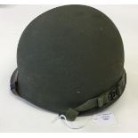 WW2 US Army M1 Steel helmet. Original rough matt OD painted finish.
