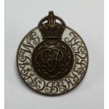 WW1 British Household Brigade Officer Cadet Battalion Enamel Cap Badge. Bronze and white enamel.