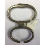 A pair of Hyatt steel clip on Handcuffs/Bull Holders. Maker marked.