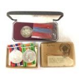 WW2 British WAAF medal group consisting of War Medal and Defence Medal with ribbons in box of issue