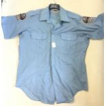 Police Uniforms and insignia collection: including a large selection of US and German Police