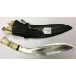 Private purchase Nepalese Kukri knife with 30cm blade. No markings. Ivory grip. Overall length 40cm.