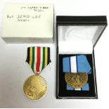 United Nations Medal in box of issue (No Clasp) and United Arab Emirates Liberation of Kuwait Medal.