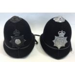 Pair of Lancashire Constabulary Police Helmets, one with Kings crown cap badge in black size ,
