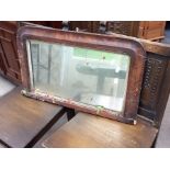 An early Victorian figured walnut over mantle mirror, c.1860