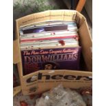 A box of vinyl records including Jim Reeves, Buddy Holly, Don Williams etc.