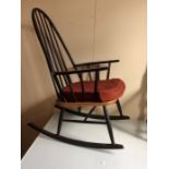 A Mid 20th Century Scandinavian Teak Rocking Chair