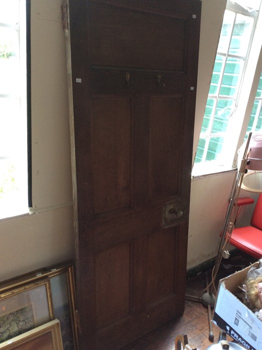 A 19th Century Oak Door, brass handles, locks and coat hooks