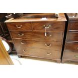 A George III mahogany chest of drawers, fitted with two short over three long graduated drawers,