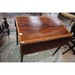A George III mahogany and satinwood cross banded Pembroke table, circa 1790, fitted with a single