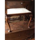 An Early 20th Century oak dressing table stool, support on cabriole legs