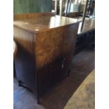 A Queen Anne style walnut veneered side cabinet, together with a matching dressing table (2)