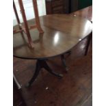 A George III style mahogany twin pedestal dining table