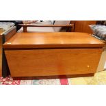 A 1970's teak side unit, the front folding down and revealing a large section