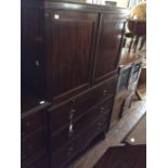 A 20th Century mahogany side cabinet, glazed doors, with drawer section and doors below