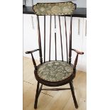 A 19th Century Windsor armchair with H stretcher and turned legs