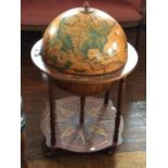 A 20th Century drinks globe on stand