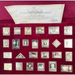 An Empire Collection of silver gilt stamp replicas.