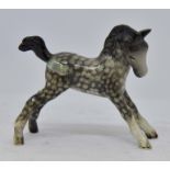 Beswick foal, small, stretched and facing right, number 815, rocking horse grey,