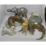 Six Branksome ceramics, two otter statues, terrier ash tray, retriever dog,