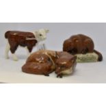 Beswick Hereford Calf number 1827C, Beswick Curled Fox number 1017 and Beswick Beaver on log,