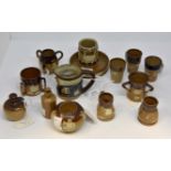 Royal Doulton miniatures including Toby Jug, beakers, jugs,