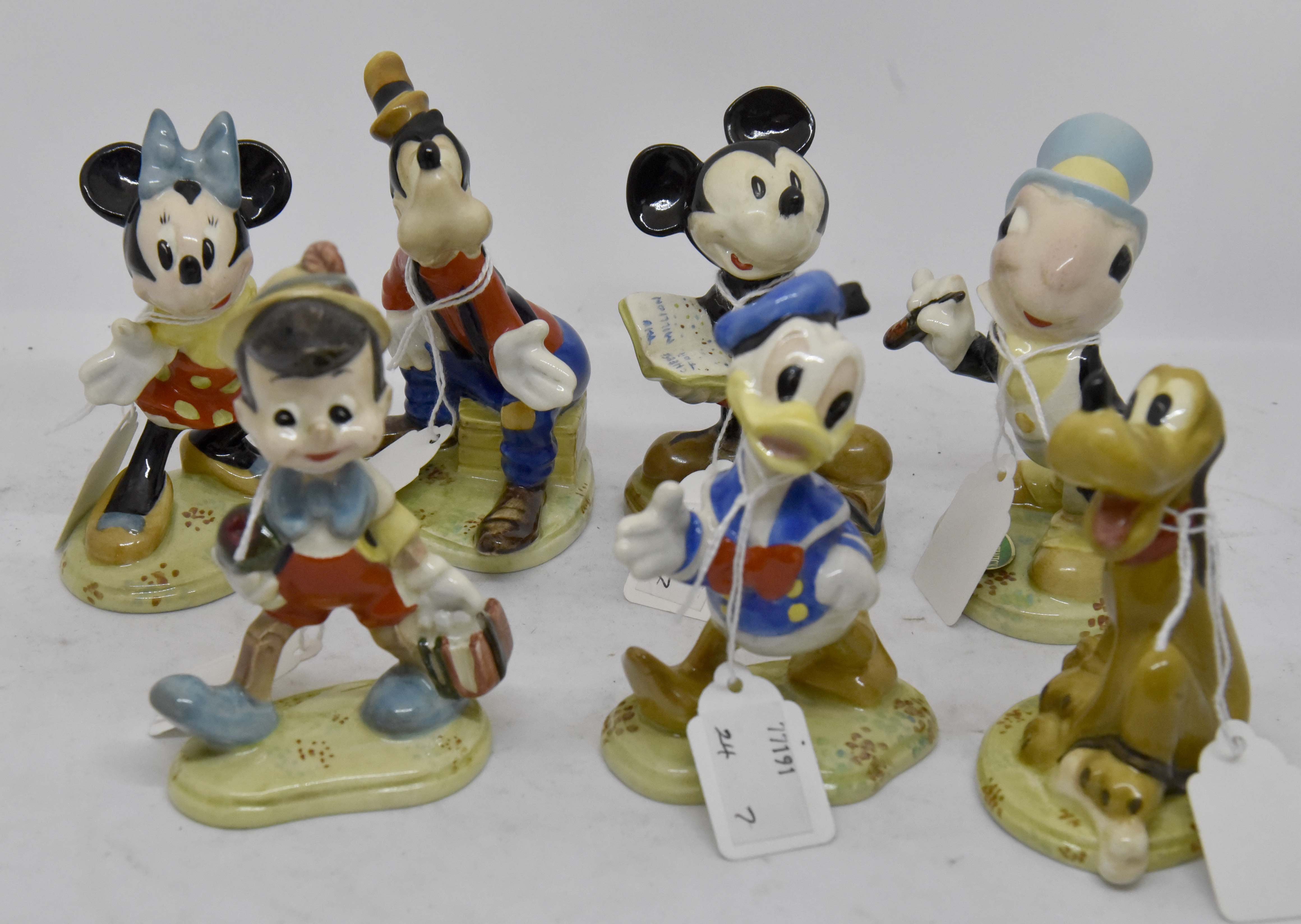 Beswick Walt Disney series figures including; Mickey Mouse, Minnie Mouse, Goofy, Pluto, Donald Duck,