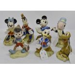 Beswick Walt Disney series figures including; Mickey Mouse, Minnie Mouse, Goofy, Pluto, Donald Duck,