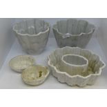 Shelley ware; three ceramic jelly moulds,