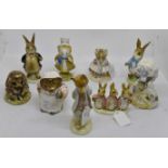 Nine Beatrix Potter statues including;