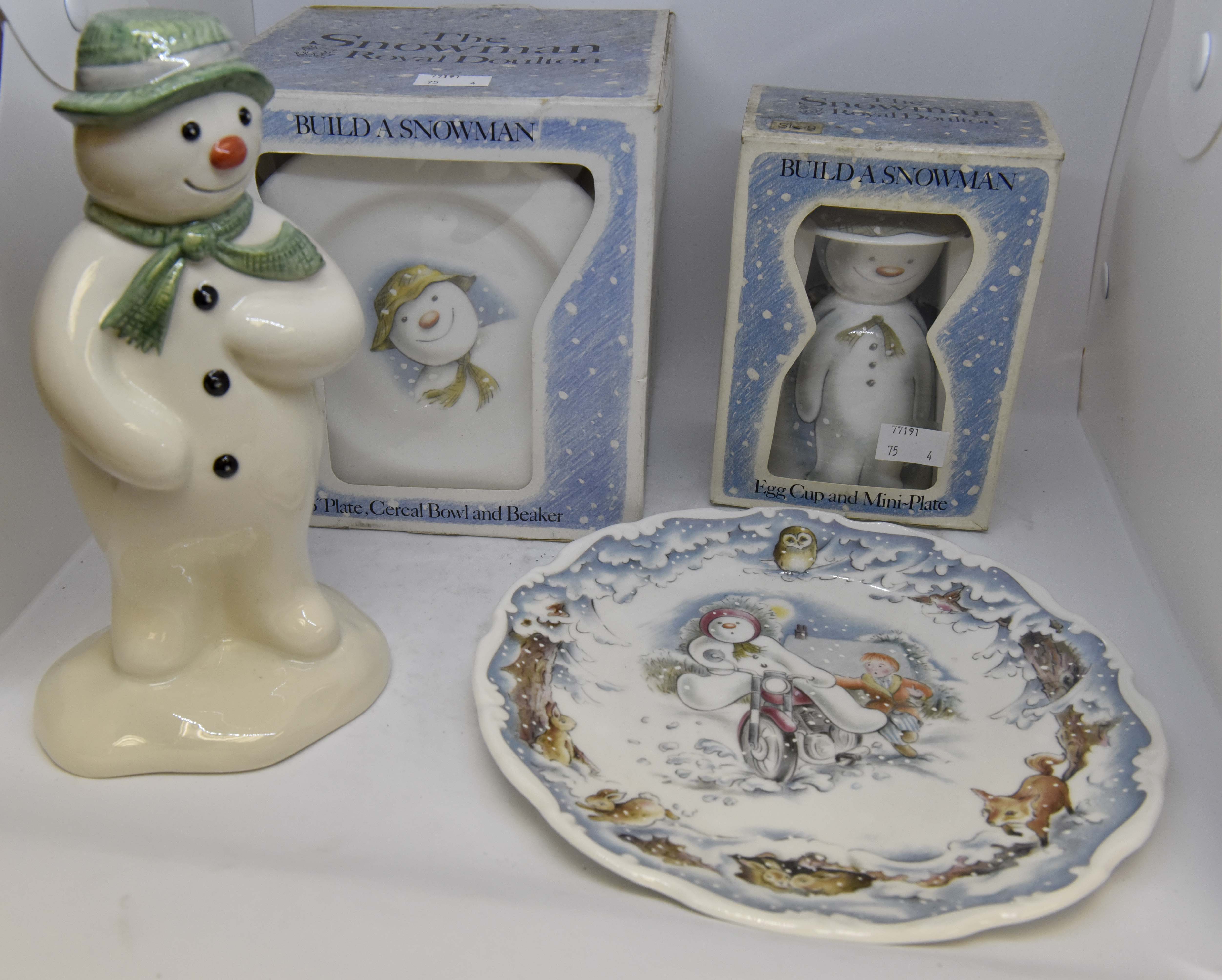 Royal Doulton The Snowman collection to include; money bank, Motor Bike Ride 8" plate, plate,