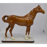 Beswick swish tail horse (gloss chestnut) number 1182, designer A Gredington,