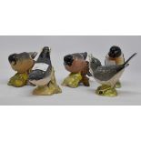 Five Beswick bird statues,
